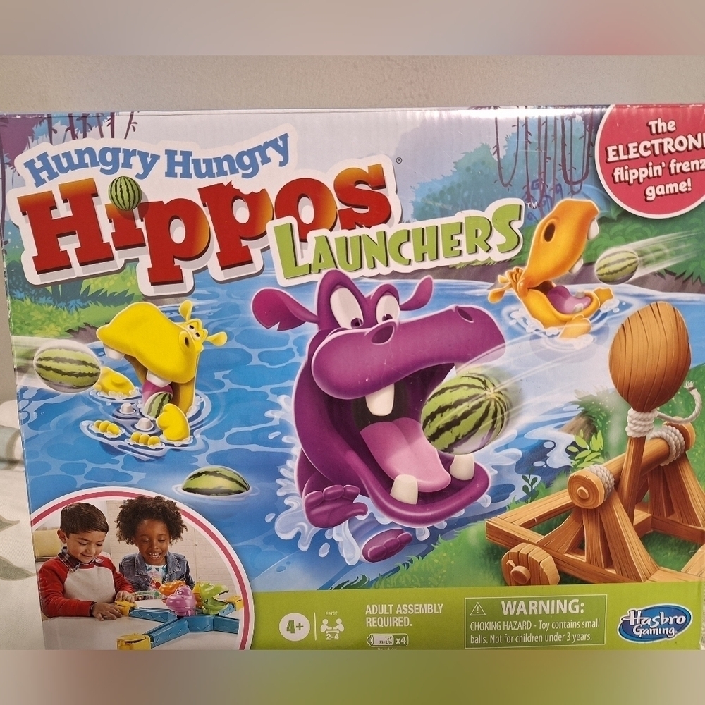 Hungry Hungry Hippos Launchers board game. New in box.